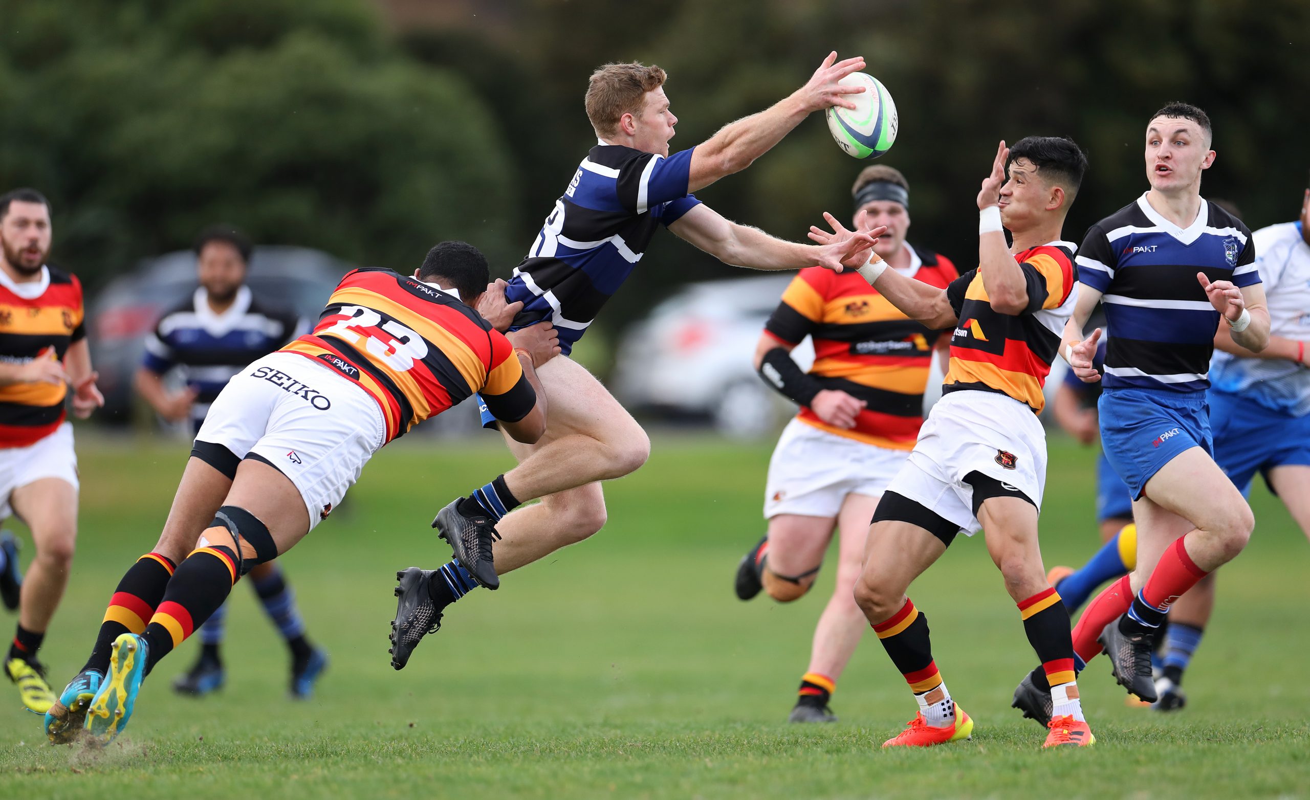 Ben Miller of Kaikorai throws a pass during the club rugby match between Kaikorai and Zingari Richmond played for the Tom Watkins Memorial Trophy at Bishopscourt in Dunedin on 7th May, 2022. © John Caswell / http://www.caswellimages.com