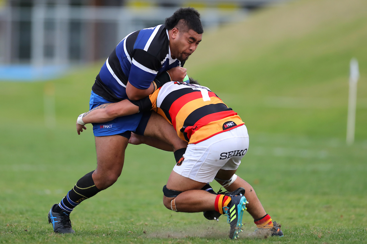 Champ Betham of Kaikorai runs into Zingari Richmond's Ashton Teau during the club rugby match between Kaikorai and Zingari Richmond played for the Tom Watkins Memorial Trophy at Bishopscourt in Dunedin on 7th May, 2022. © John Caswell / http://www.caswellimages.com