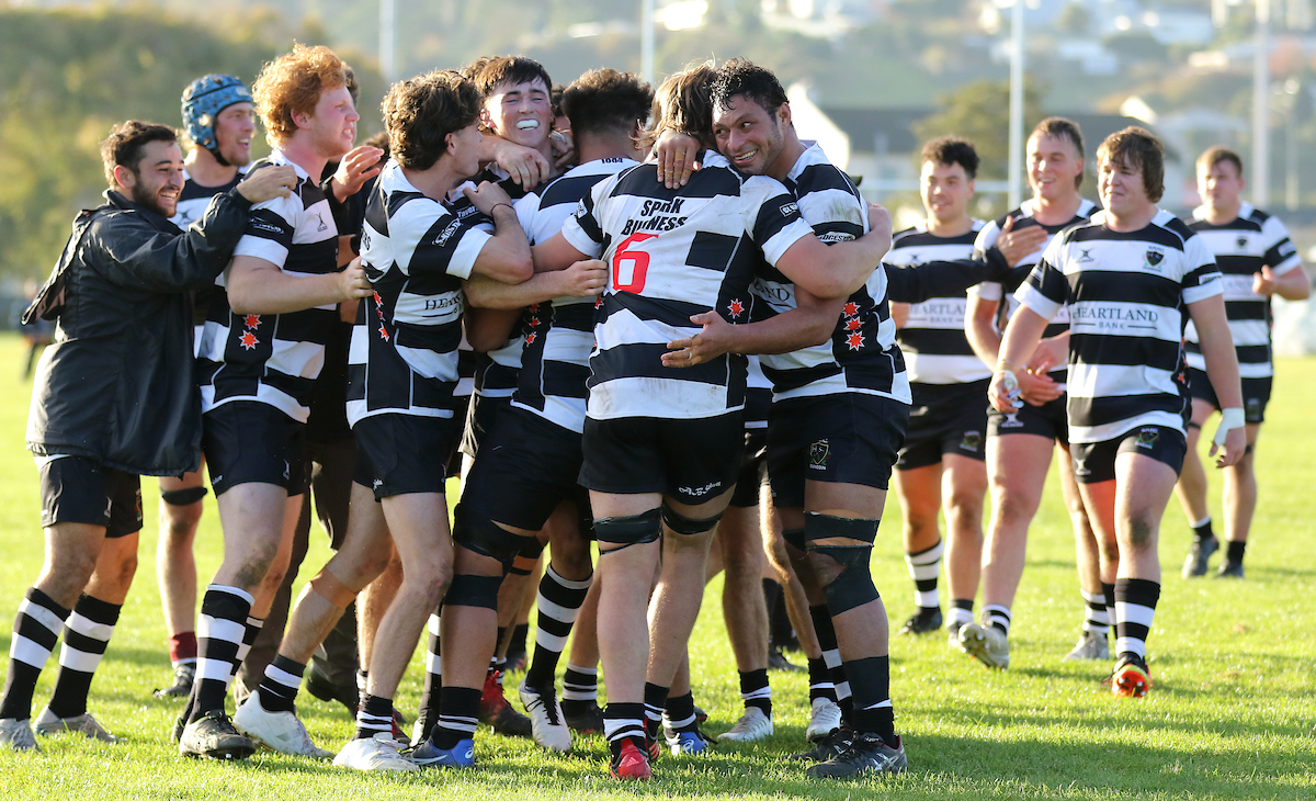 Southern celebrate winning the club rugby match between Southern and Otago University played for the V.G.Cavanagh Memorial Trophy at Bathgate Park in Dunedin on Saturday 30th April, 2022. © John Caswell / http://www.caswellimages.com