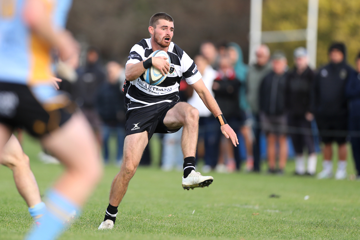 Mackenzie Haugh of Southern runs into a gap during the club rugby match between Southern and Otago University played for the V.G.Cavanagh Memorial Trophy at Bathgate Park in Dunedin on Saturday 30th April, 2022. © John Caswell / http://www.caswellimages.com