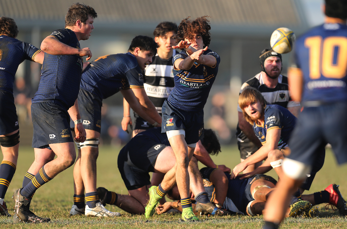 Devon Olliver-Bell of Dunedin throws a pass during the Premier Quarter Final club rugby match between Dunedin and Southern played at Kettle Park in Dunedin on Saturday 2nd July, 2022. © John Caswell / https://tapebootsandbeer.com/