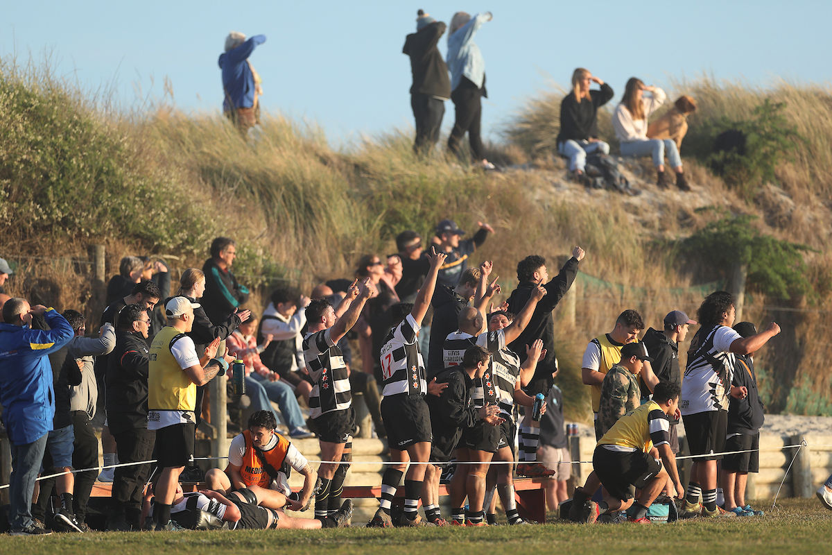 The Southern bench celebrate during the Premier Quarter Final club rugby match between Dunedin and Southern played at Kettle Park in Dunedin on Saturday 2nd July, 2022. © John Caswell / https://tapebootsandbeer.com/
