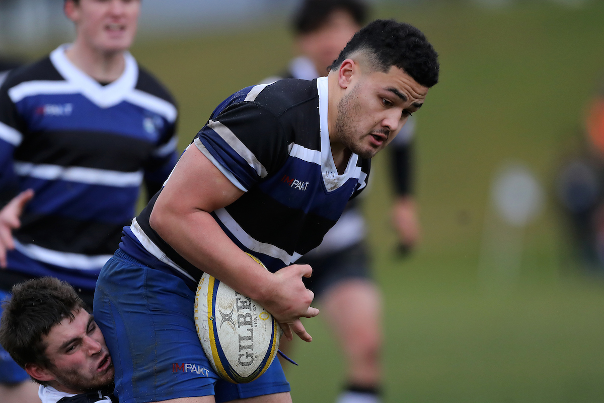 Filipo Whitehouse-Opetaia Tovio of Kaikorai stands in a tackle during the Premier Quarter Final club rugby match between Dunedin and Southern played at Kettle Park in Dunedin on Saturday 9th July, 2022. © John Caswell / https://tapebootsandbeer.com/
